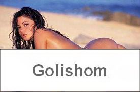 Сексуальная нудистка на пляже в песке